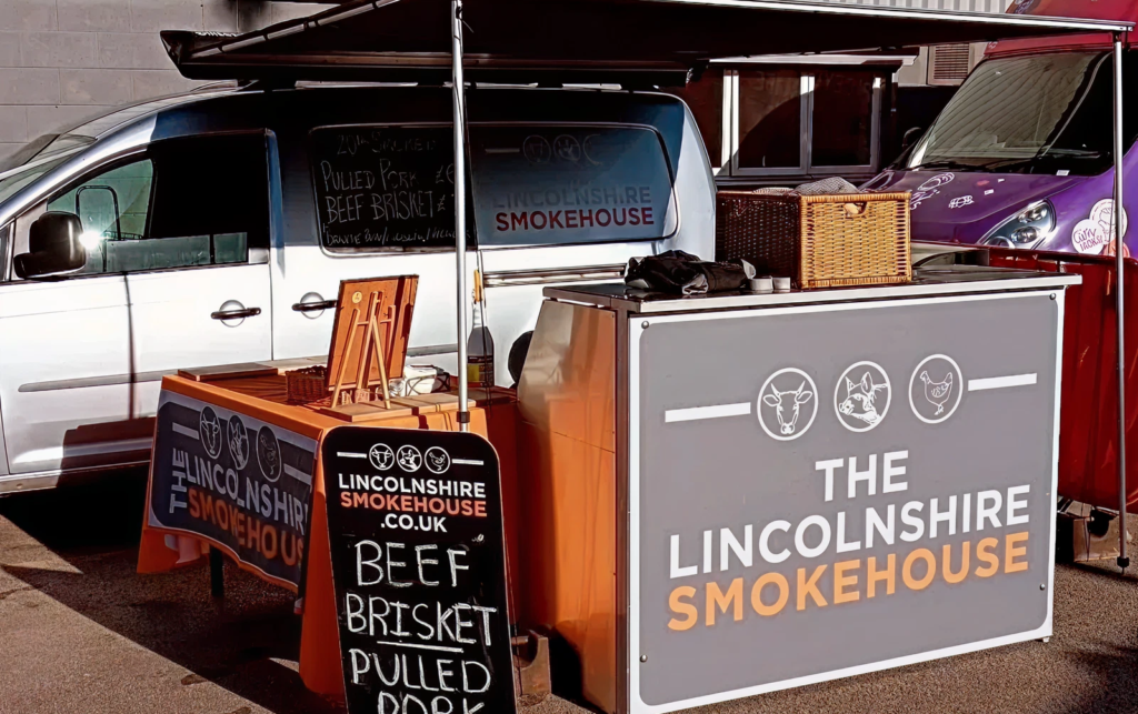 Food truck with smokehouse sign