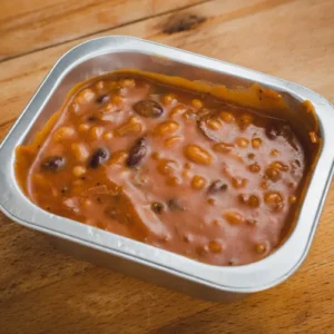 Baked beans in a metal tray
