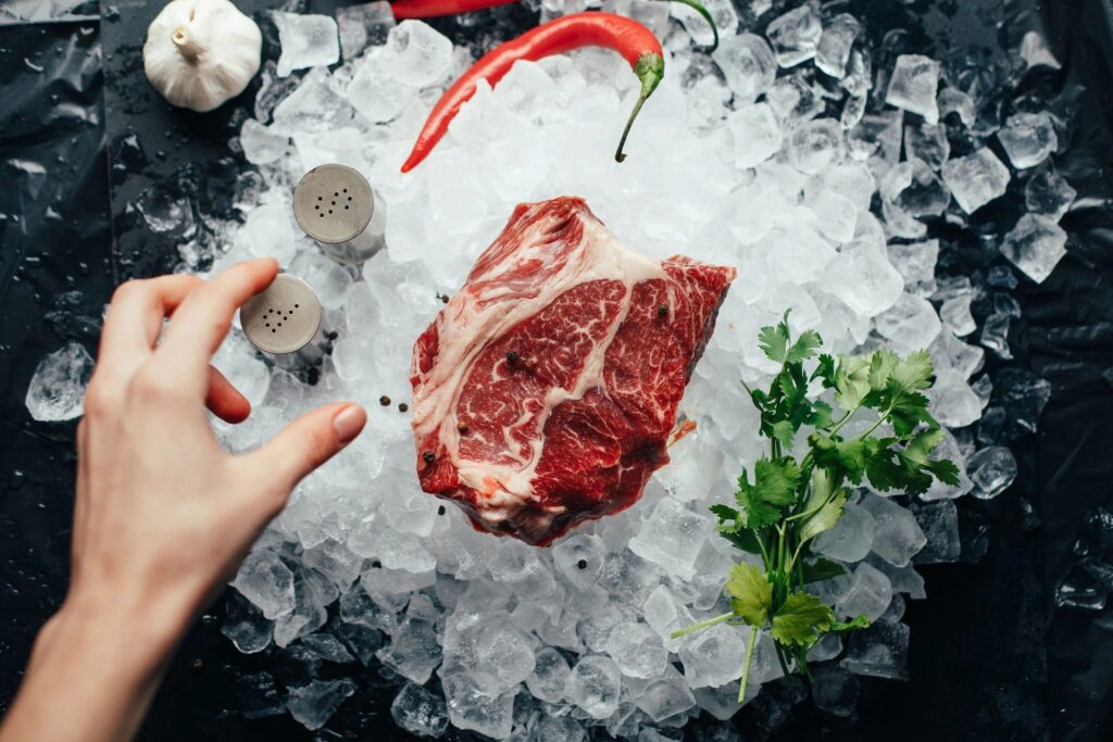 Fresh beef surrounded by ice cubes
