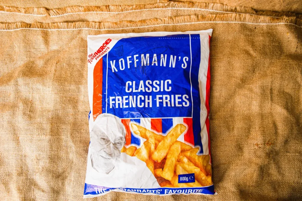 Koffmann's Classic French Fries package on a textured surface.